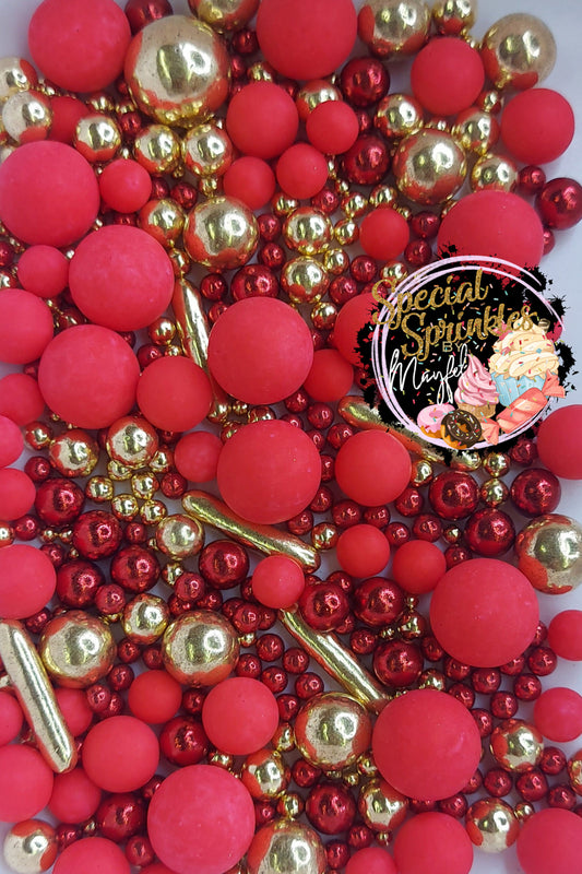 Perlas rojas y oro